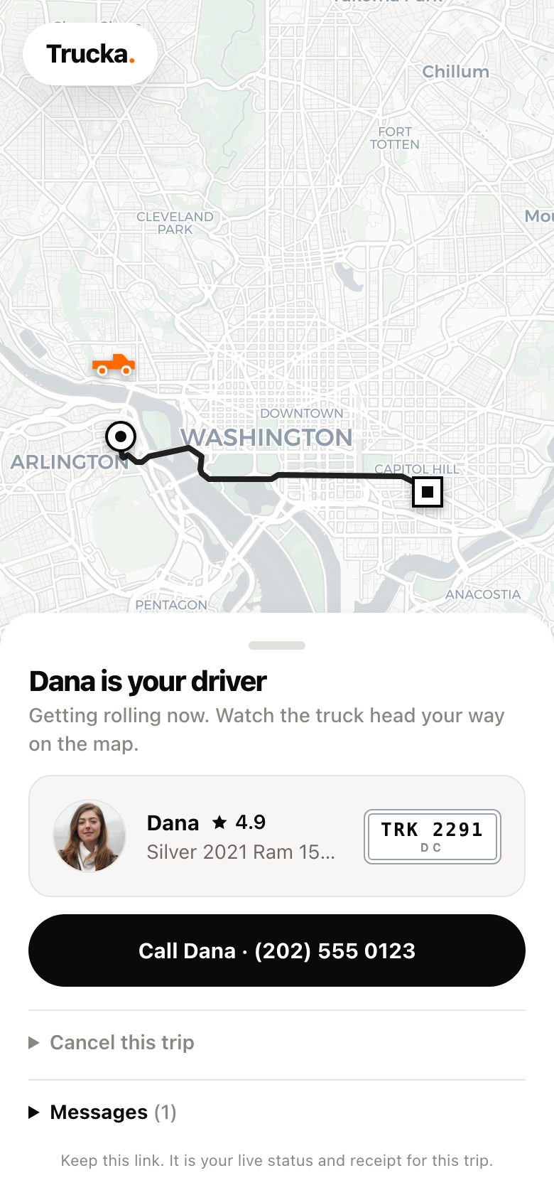 Trucka app screenshot showing a matched driver with photo, rating, and plate while the truck approaches on the map